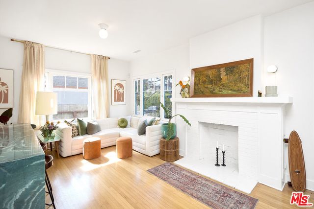 a kitchen with stainless steel appliances granite countertop a refrigerator and a stove