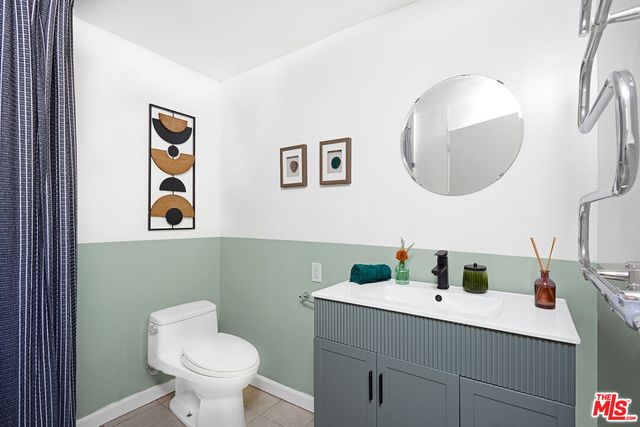 a bedroom with furniture and a couch