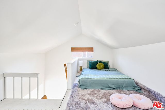 a table and chairs in front of a house