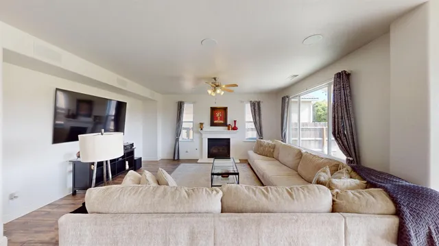 a living room with furniture and a couch