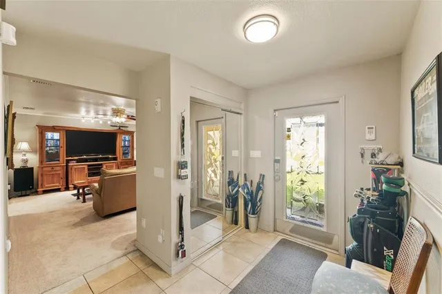 a view of a livingroom with furniture and windows