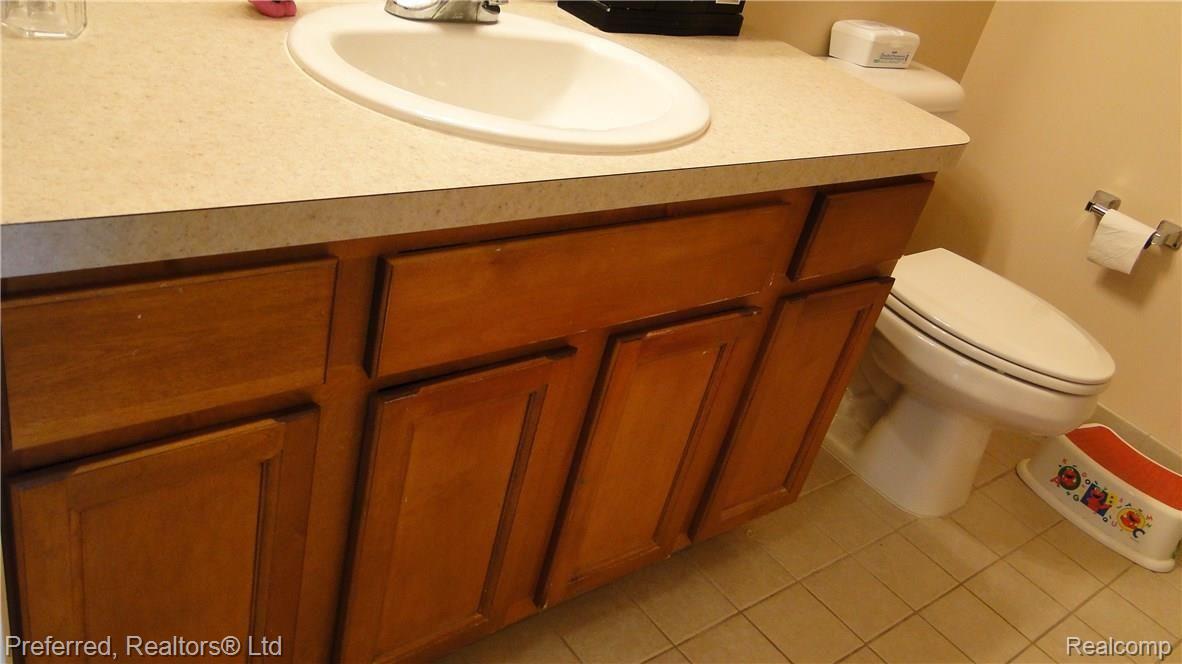 41496 Glade Road, Unit 58 Canton, MI 48187 - Photo 34 of 39 CERAMIC TILE FLOOR