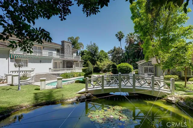 a view of a house with swimming pool