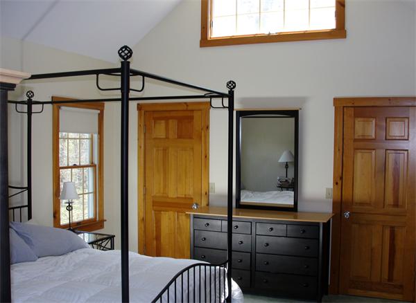 578 Huckins Neck Road Barnstable, MA 02632 - Photo 9 of 13 a bathroom with a sink a mirror and a window