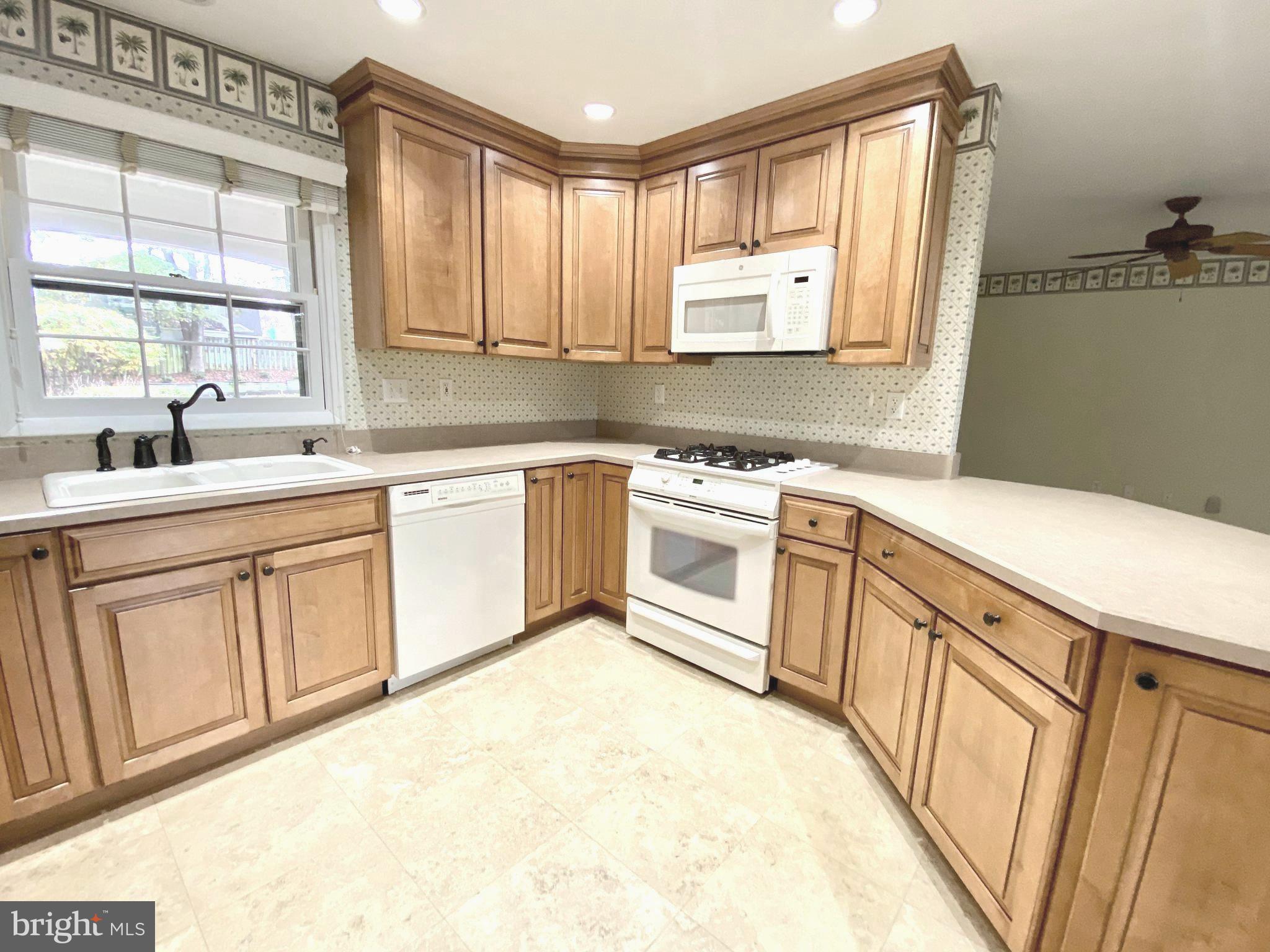 1791 Roxboro Place Crofton, MD 21114 - Photo 13 of 37 Kitchen view into Family Room