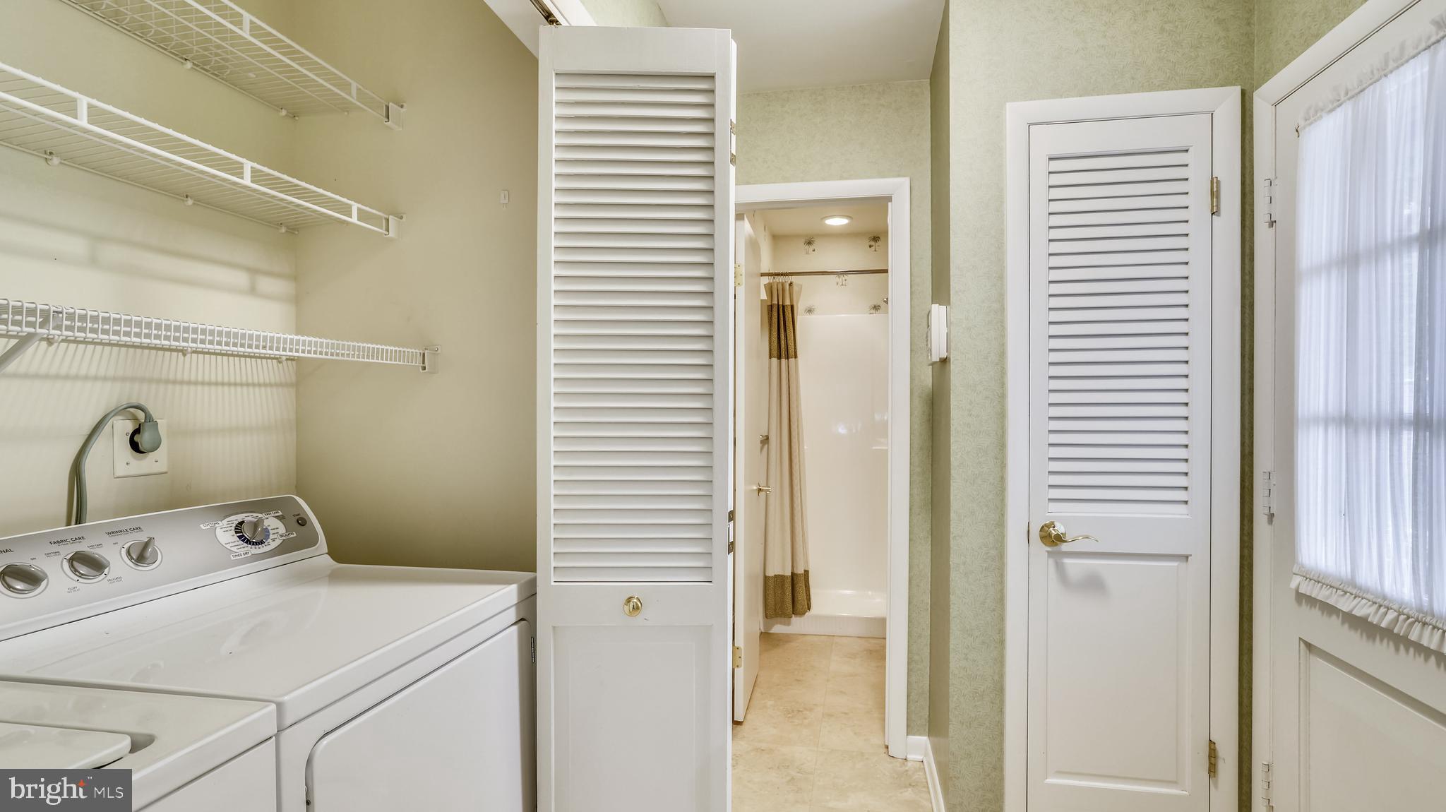 1791 Roxboro Place Crofton, MD 21114 - Photo 29 of 37 Laundry Room View Into Bathroom 3