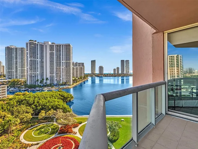 a spacious bathroom with a double vanity sink mirror and bathtub