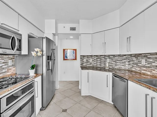 a bathroom with a shower and a toilet