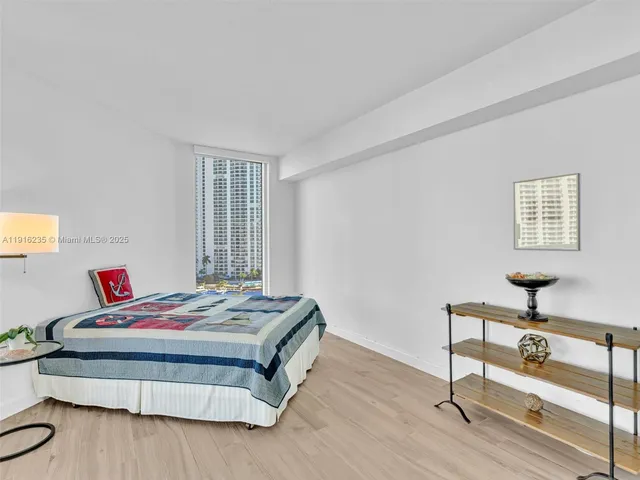 a view of a backyard with a garden and plants