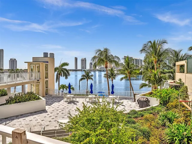 a view of a swimming pool with a yard