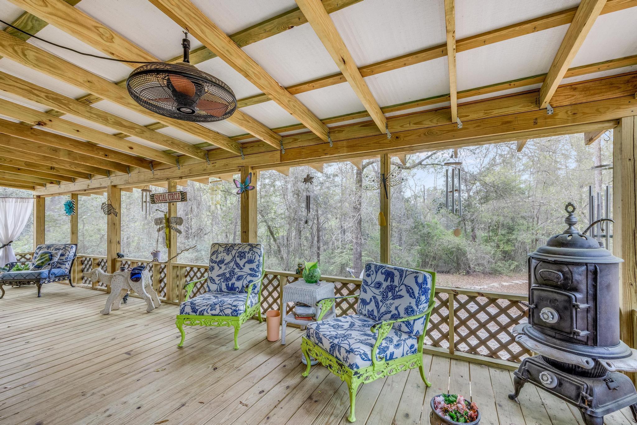 5084 Richardson Road Crestview, FL 32539 - Photo 12 of 24 a outdoor living space with furniture