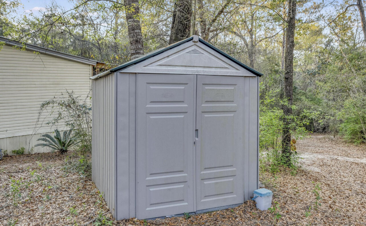 5084 Richardson Road Crestview, FL 32539 - Photo 24 of 24 a house with a outdoor space