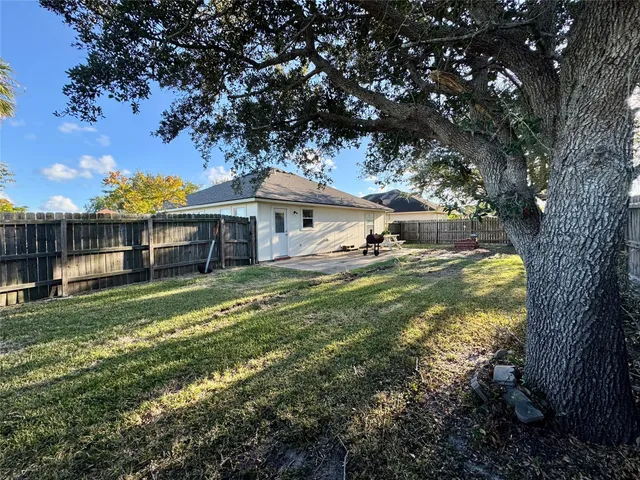 a view of house with outdoor space and sitting area