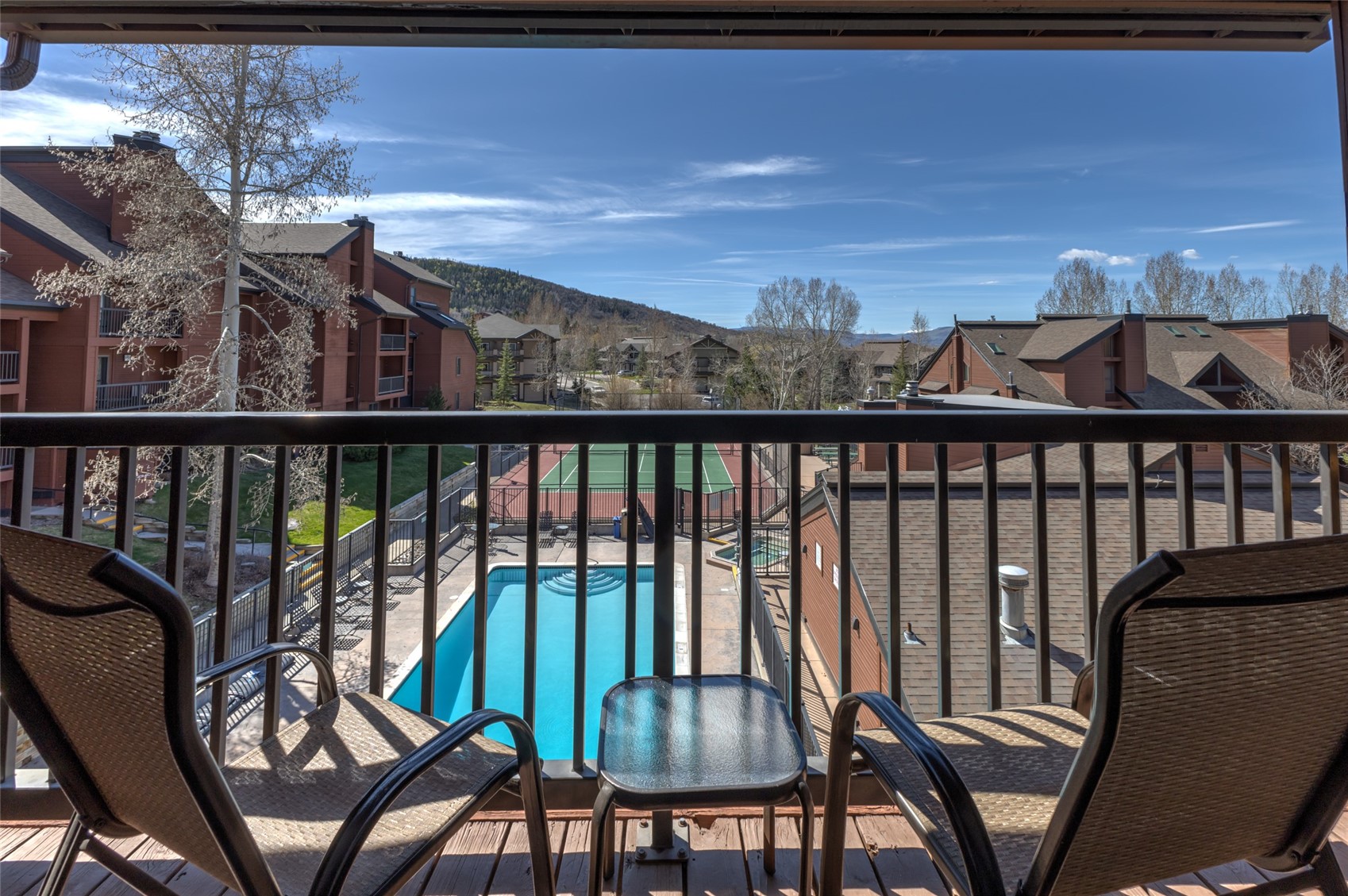 2025 Walton Creek Road, Unit 308 Steamboat Springs, CO 80487 - Photo 2 of 34 a view of a balcony with chairs