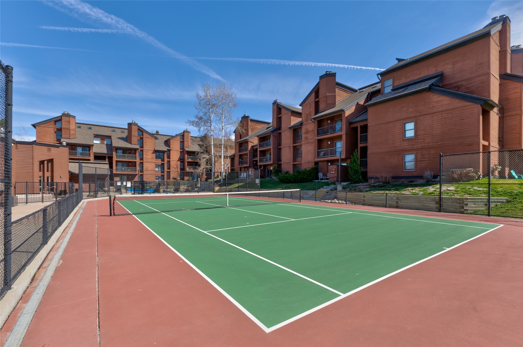 2025 Walton Creek Road, Unit 308 Steamboat Springs, CO 80487 - Photo 30 of 34 a view of a tennis court