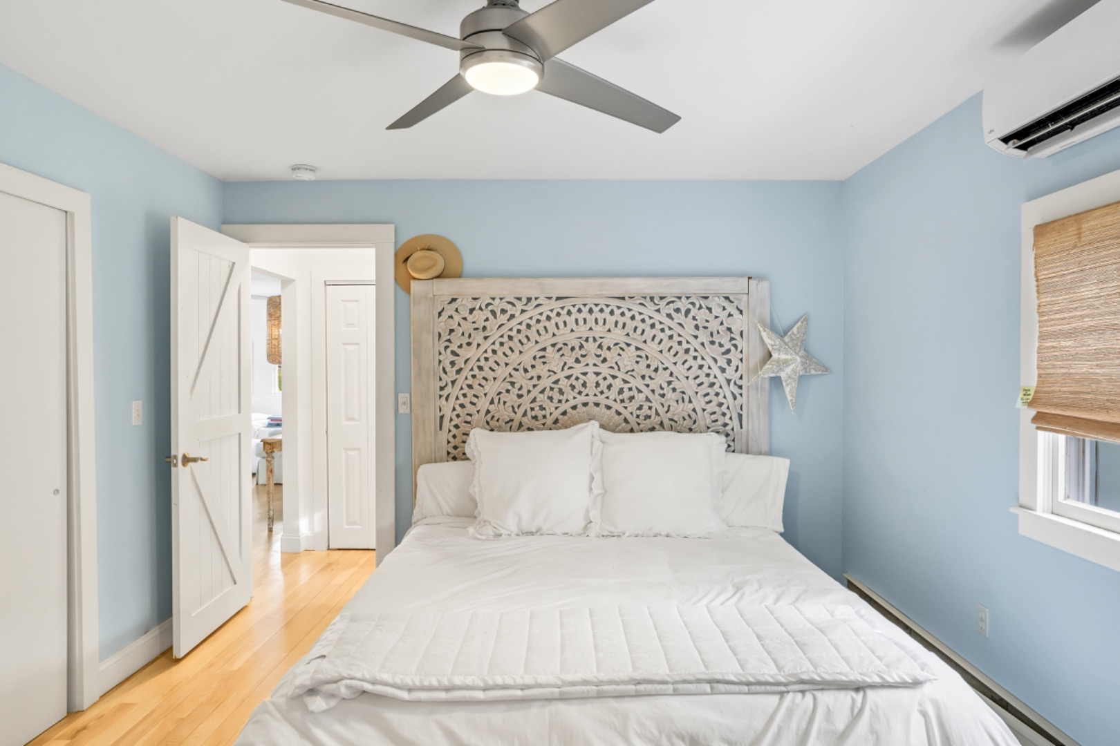 54 Lake Street Vineyard Haven, MA 02568 - Photo 26 of 30 a bedroom with a bed and window