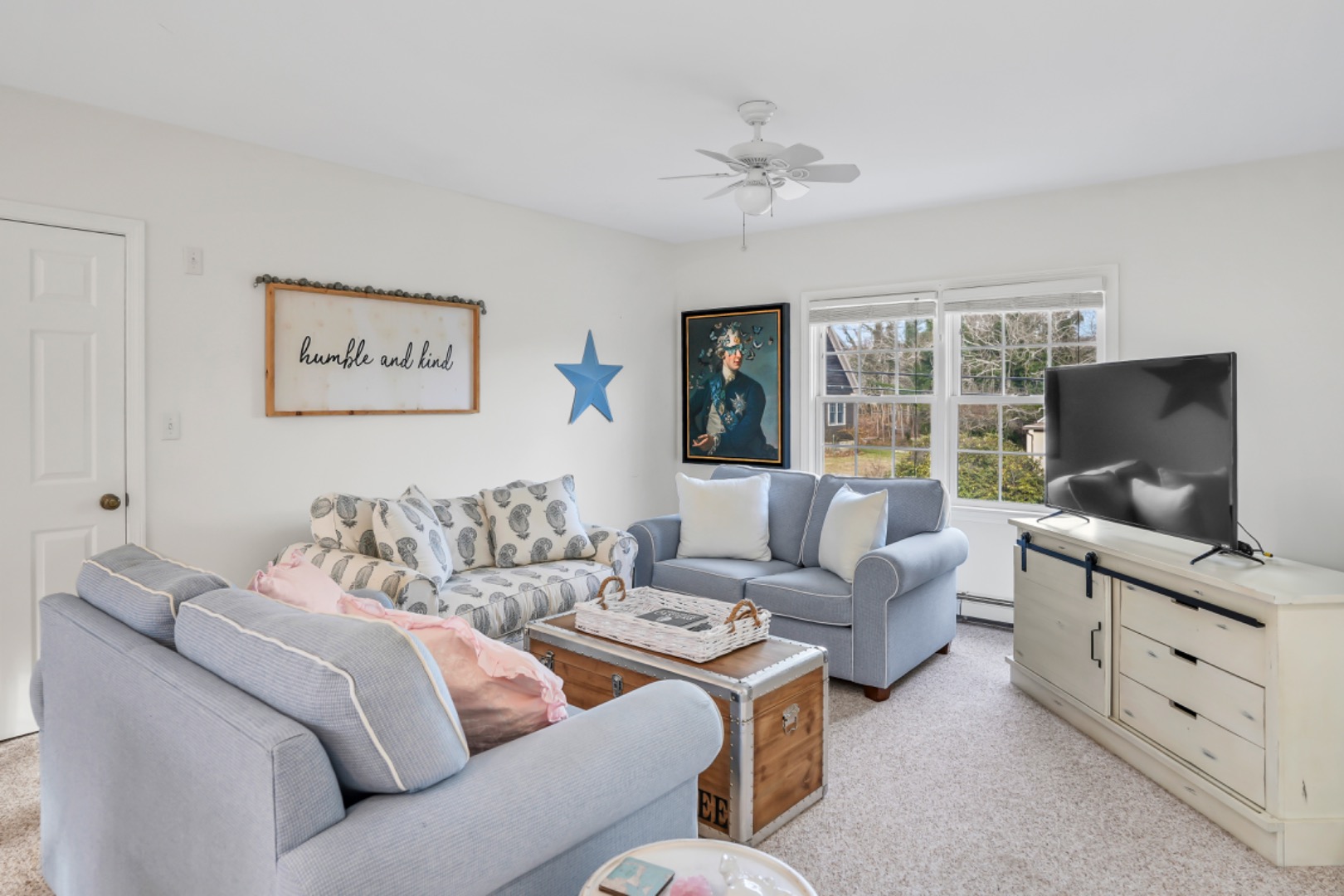 54 Lake Street Vineyard Haven, MA 02568 - Photo 6 of 30 a living room with furniture and a flat screen tv