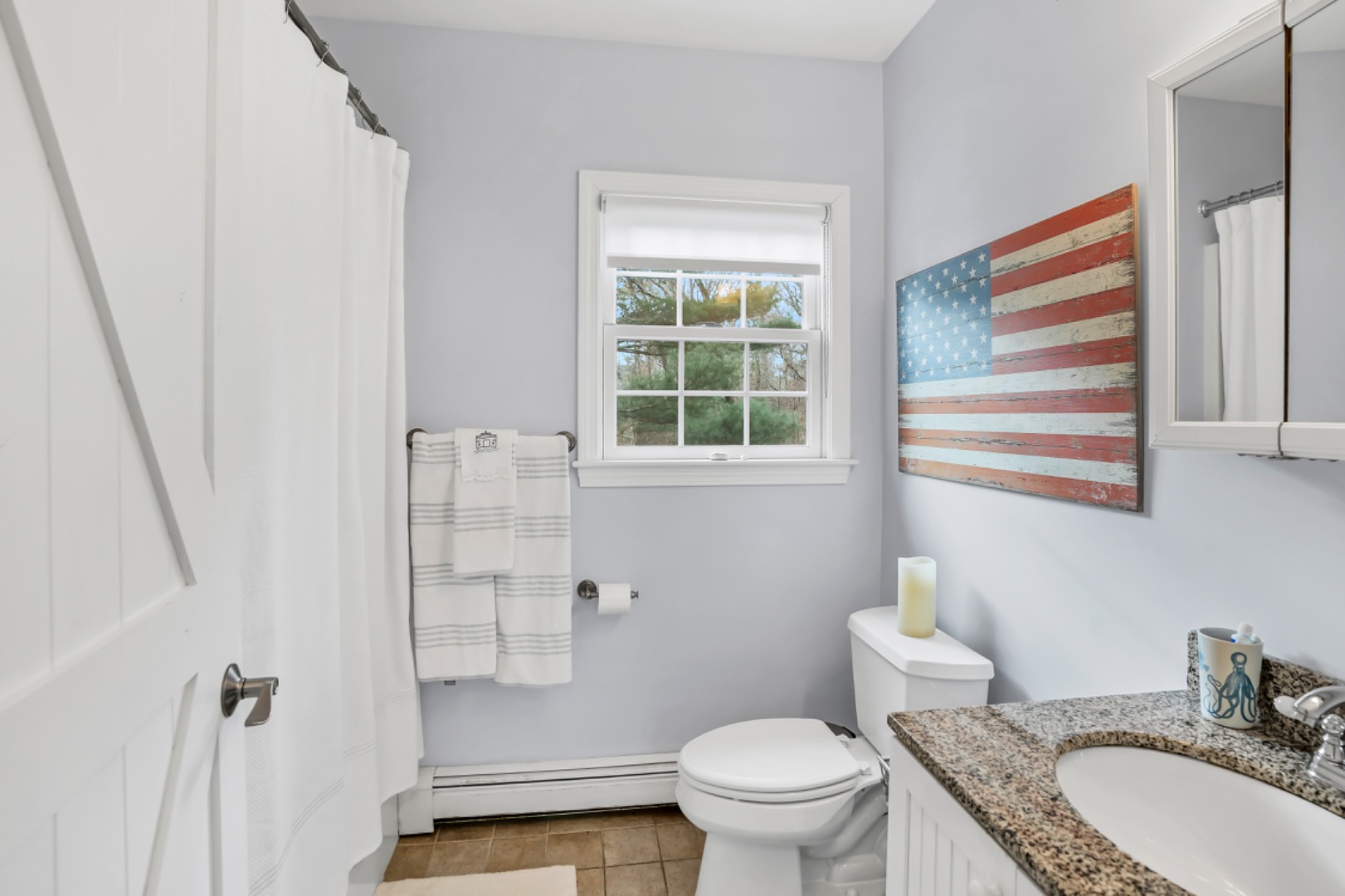 54 Lake Street Vineyard Haven, MA 02568 - Photo 10 of 30 a bathroom with a granite countertop sink toilet and shower