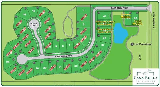 a view of a room that has a fireplace and a table in it