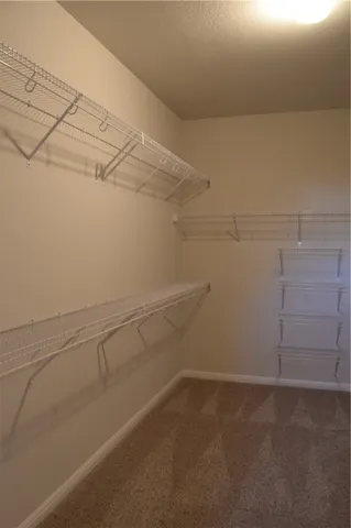 a view of a room with racks on the wall