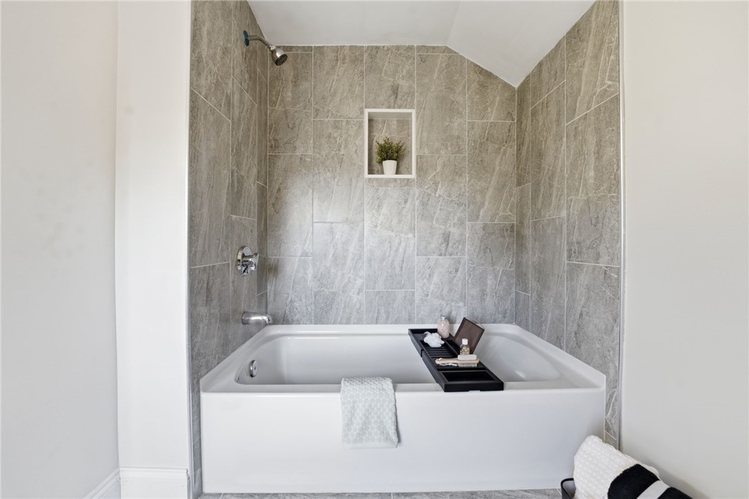 207 Mendon Road Cumberland, RI 02864 - Photo 13 of 22 New bathtub with tile surround and niche