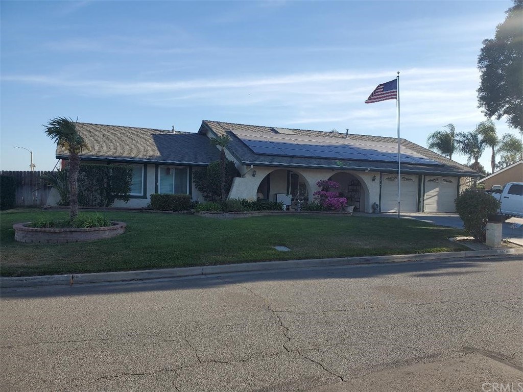 16743 Stallion Place Riverside, CA 92504 - Photo 1 of 1 front view of house with a yard