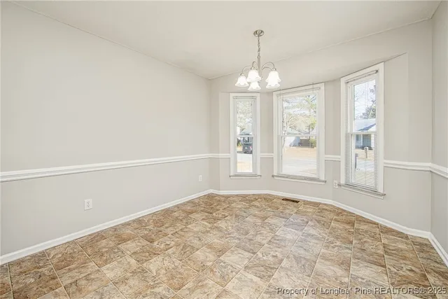 a view of a kitchen with a sink