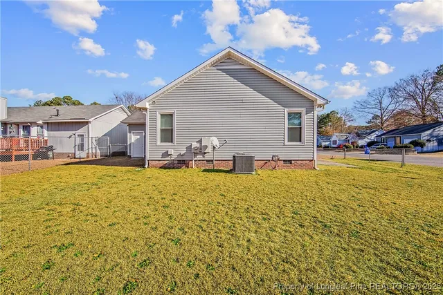 a view of a house with swimming pool yard and outdoor seating