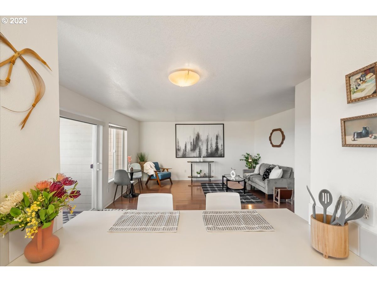 3515 Southwest Barbur Boulevard, Unit P1 Portland, OR 97239 - Photo 13 of 35 a living room with furniture flowerpot and window