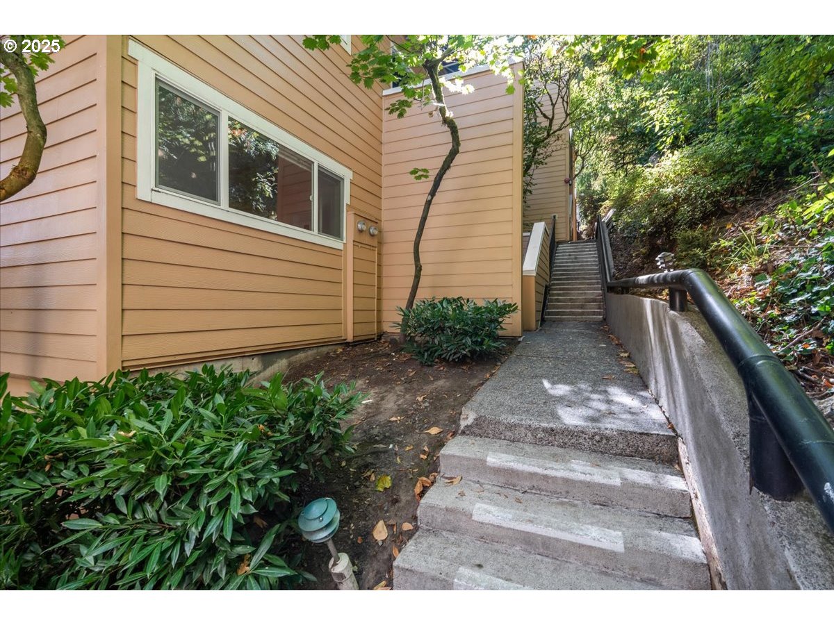 3515 Southwest Barbur Boulevard, Unit P1 Portland, OR 97239 - Photo 24 of 35 a view of a backyard with pathway