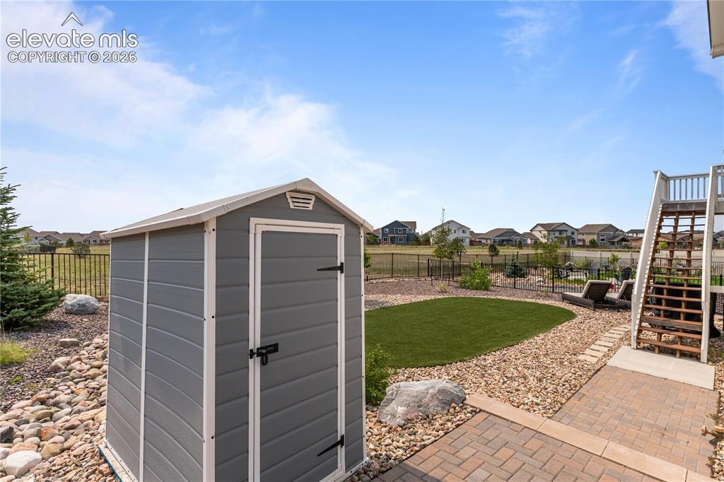 12781 Granite Ridge Drive Peyton, CO 80831 - Photo 35 of 41 Shed for additional storage.
