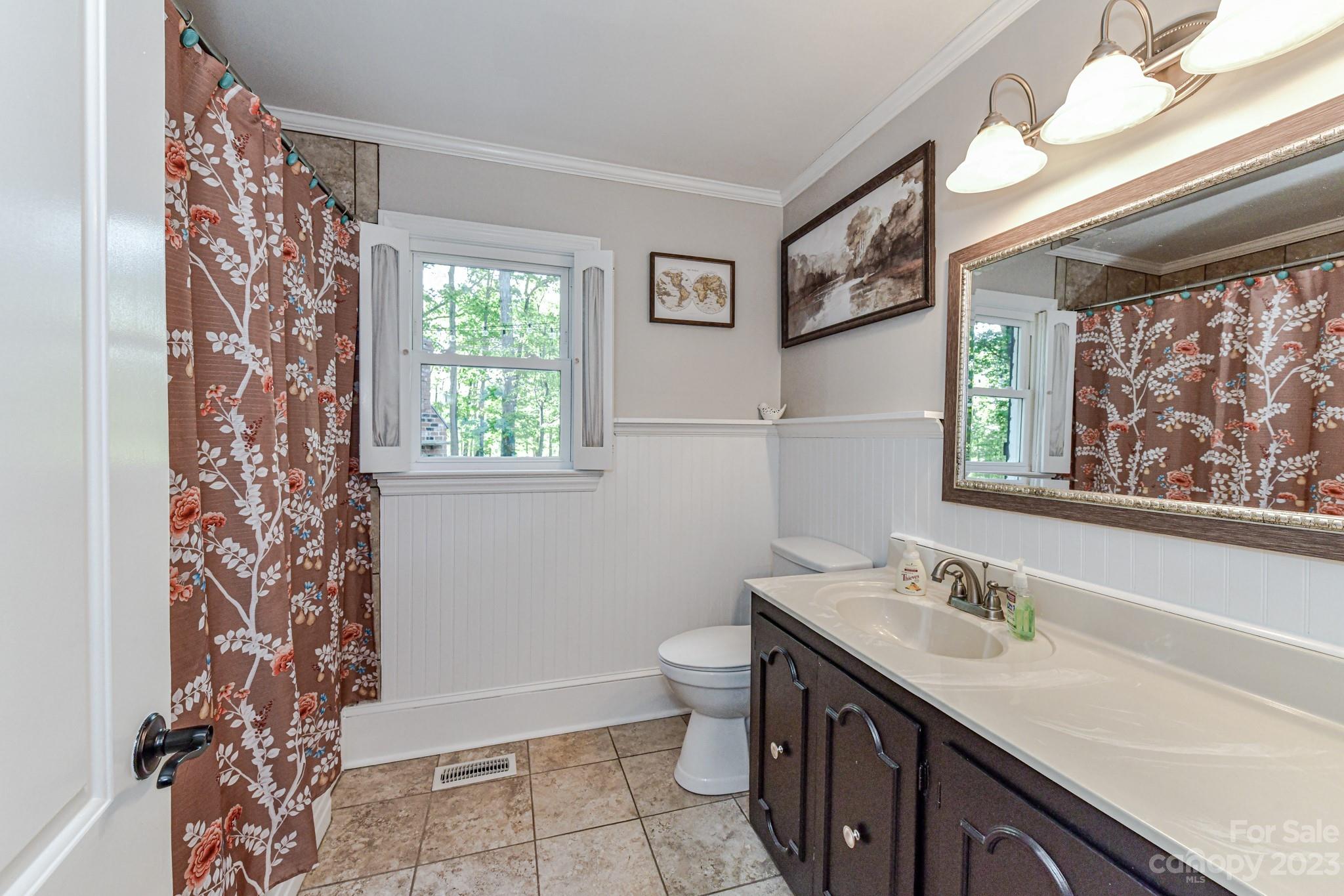 1050 Ben Black Road Midland, NC 28107 - Photo 27 of 48 a bathroom with a granite countertop sink toilet and shower