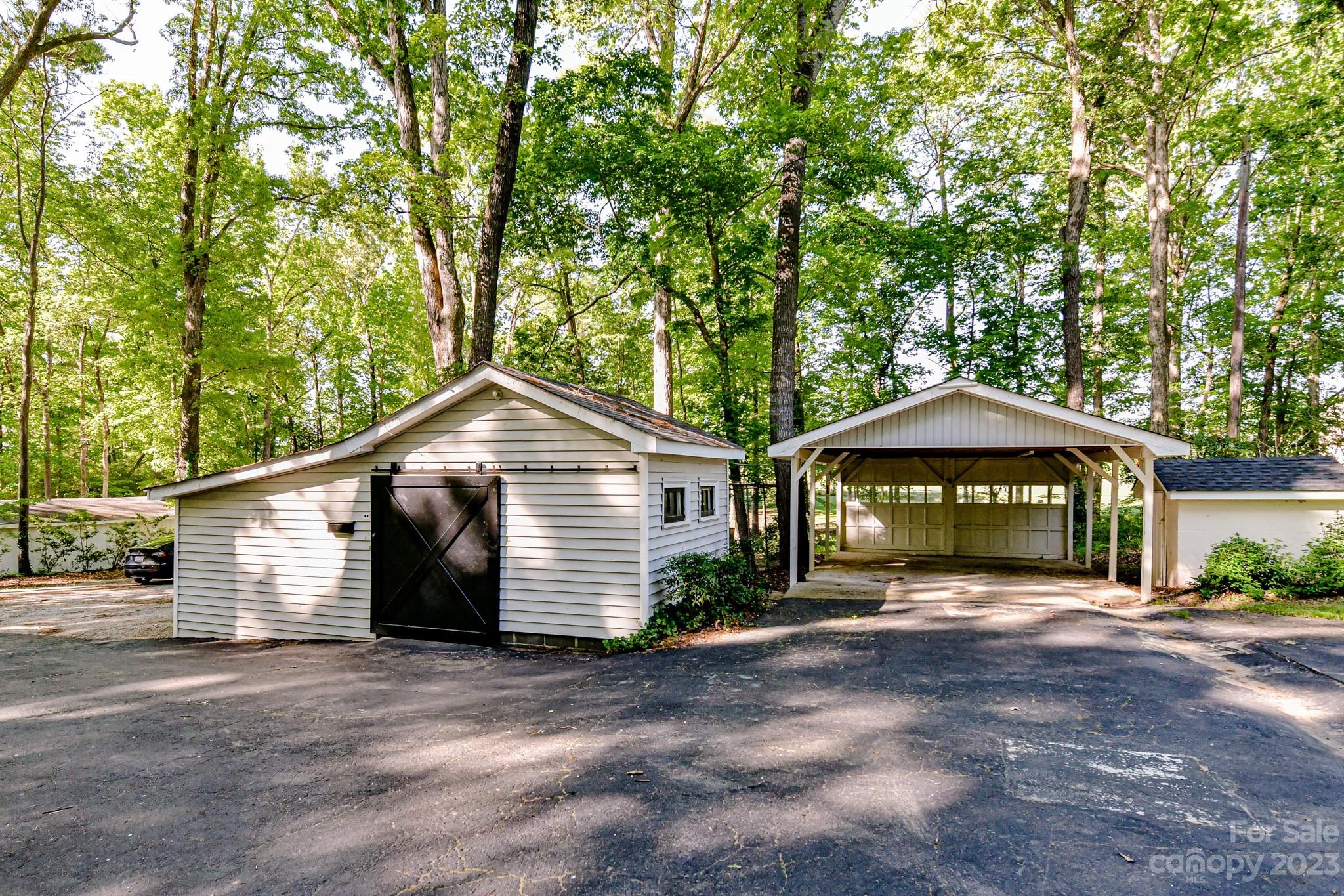 1050 Ben Black Road Midland, NC 28107 - Photo 38 of 48 a view of a house with a yard and large tree