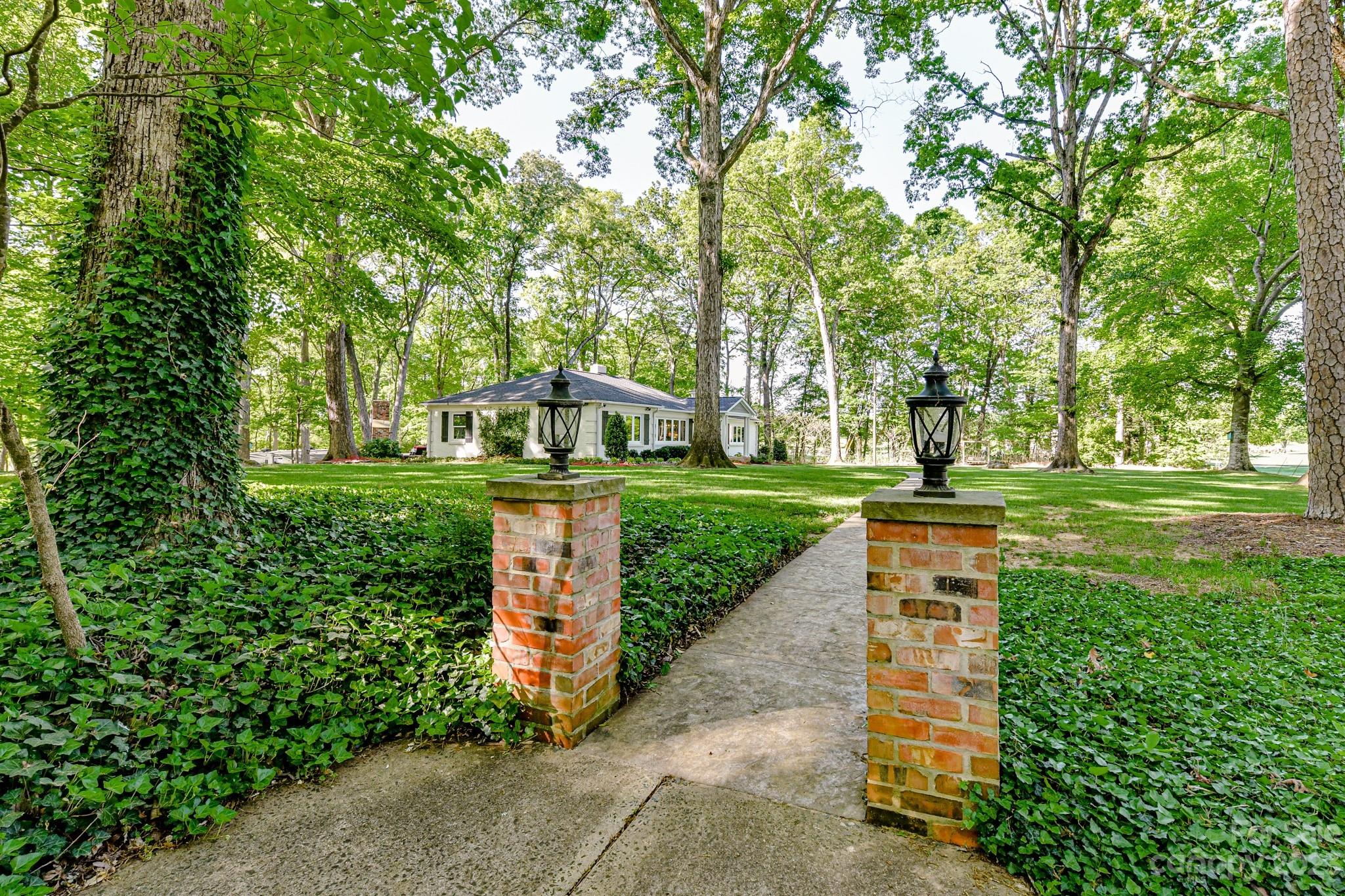 1050 Ben Black Road Midland, NC 28107 - Photo 40 of 48 a view of a park with plants and trees