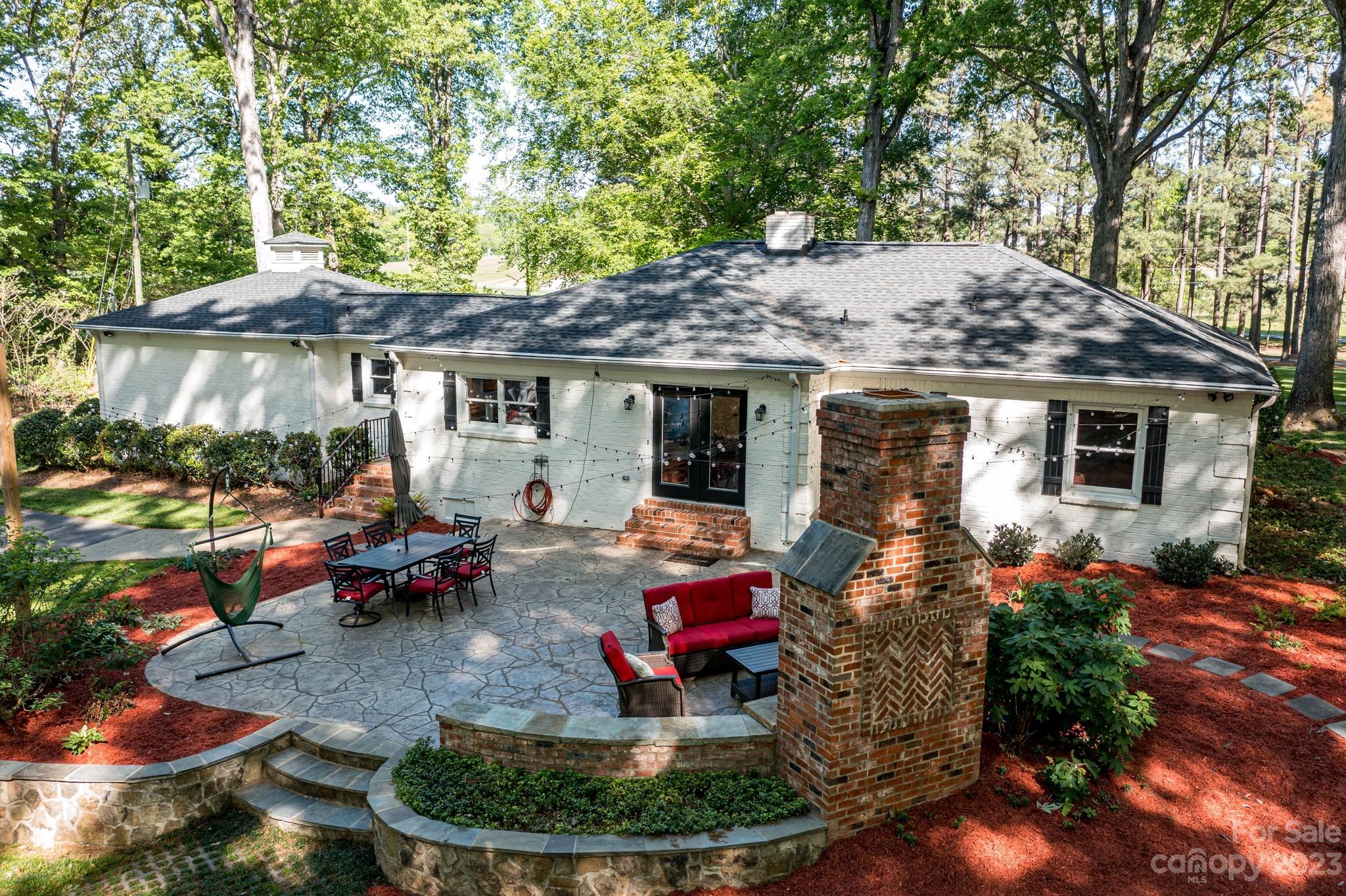 1050 Ben Black Road Midland, NC 28107 - Photo 45 of 48 a backyard of a house with yard fire pit and outdoor seating