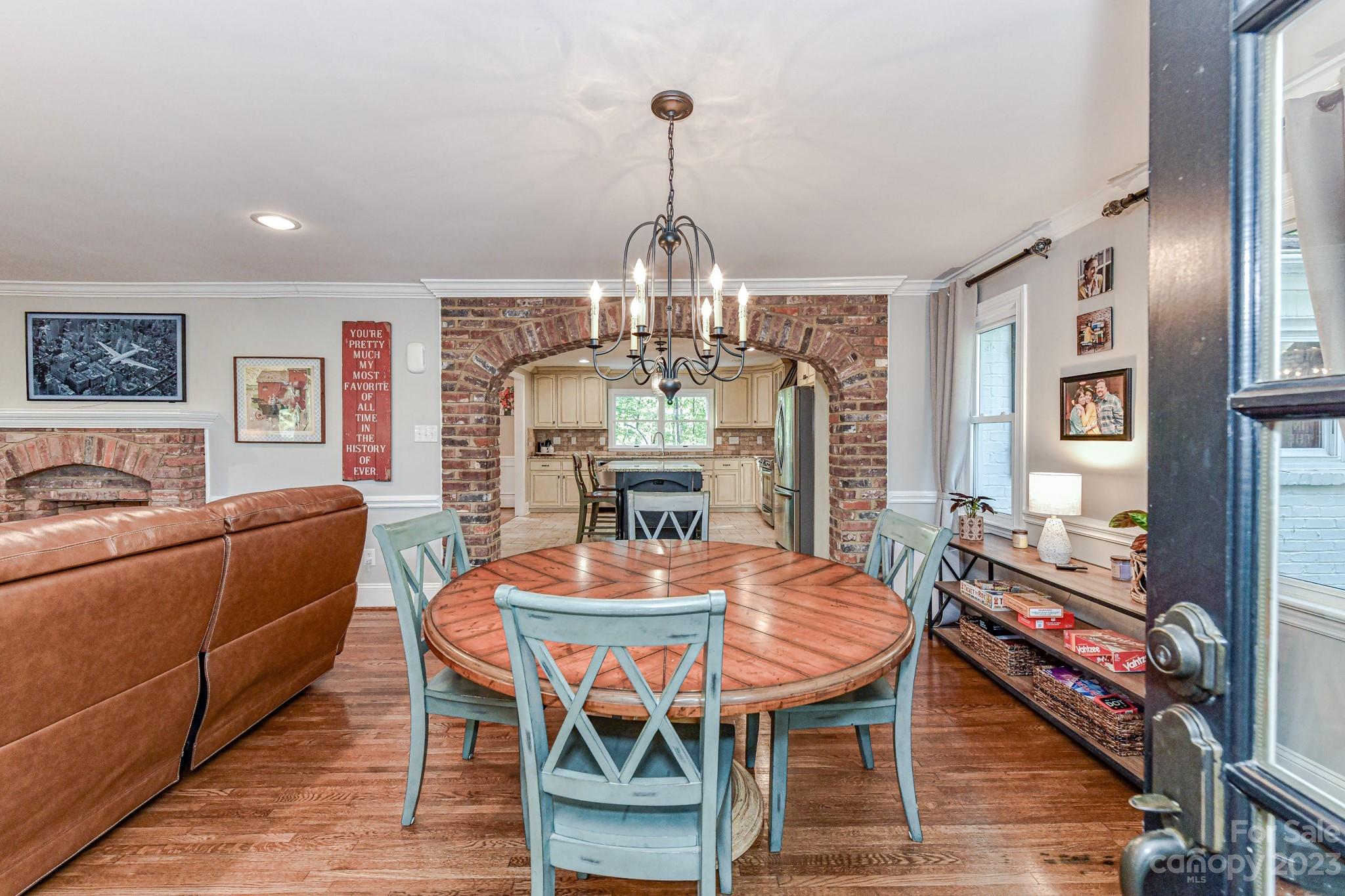 1050 Ben Black Road Midland, NC 28107 - Photo 5 of 48 a view of a dining room with furniture window and wooden floor