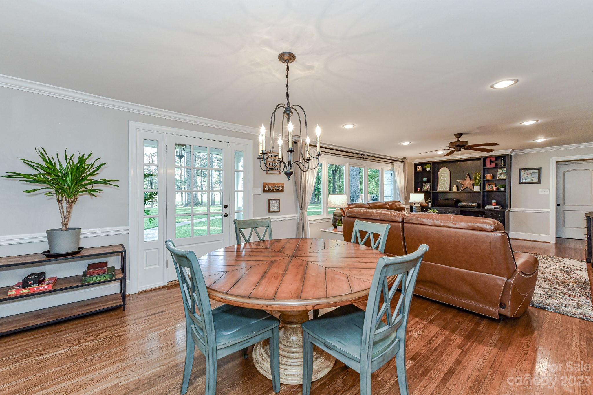 1050 Ben Black Road Midland, NC 28107 - Photo 7 of 48 a dining room with furniture and wooden floor