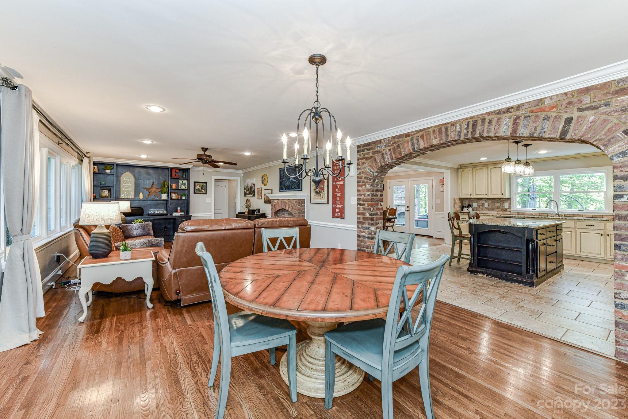 1050 Ben Black Road Midland, NC 28107 - Photo 8 of 48 a view of a dining room with furniture window and wooden floor