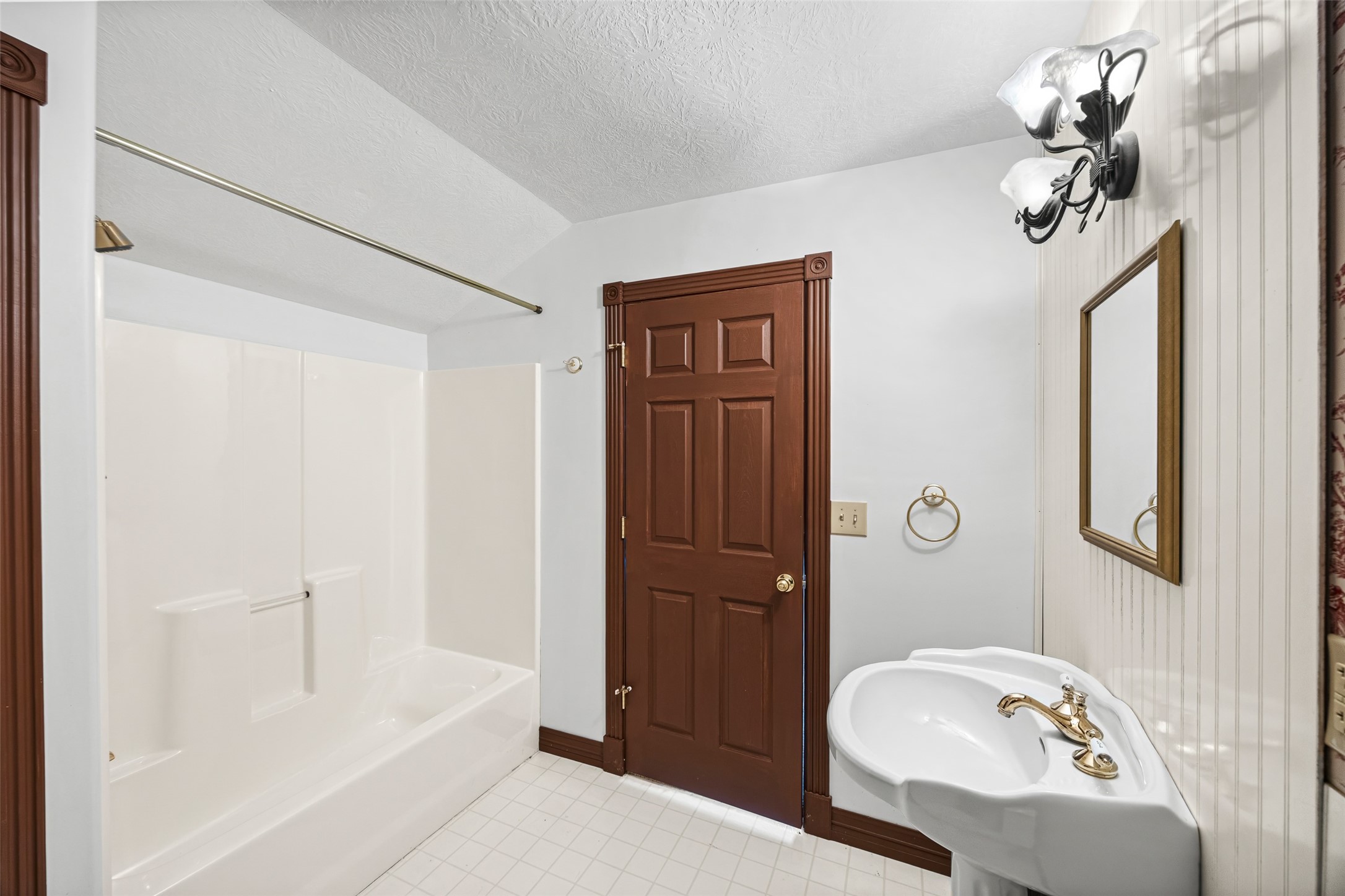 7 Northwood Country Road Huffman, TX 77336 - Photo 34 of 50 a bathroom with a granite countertop sink a toilet and shower