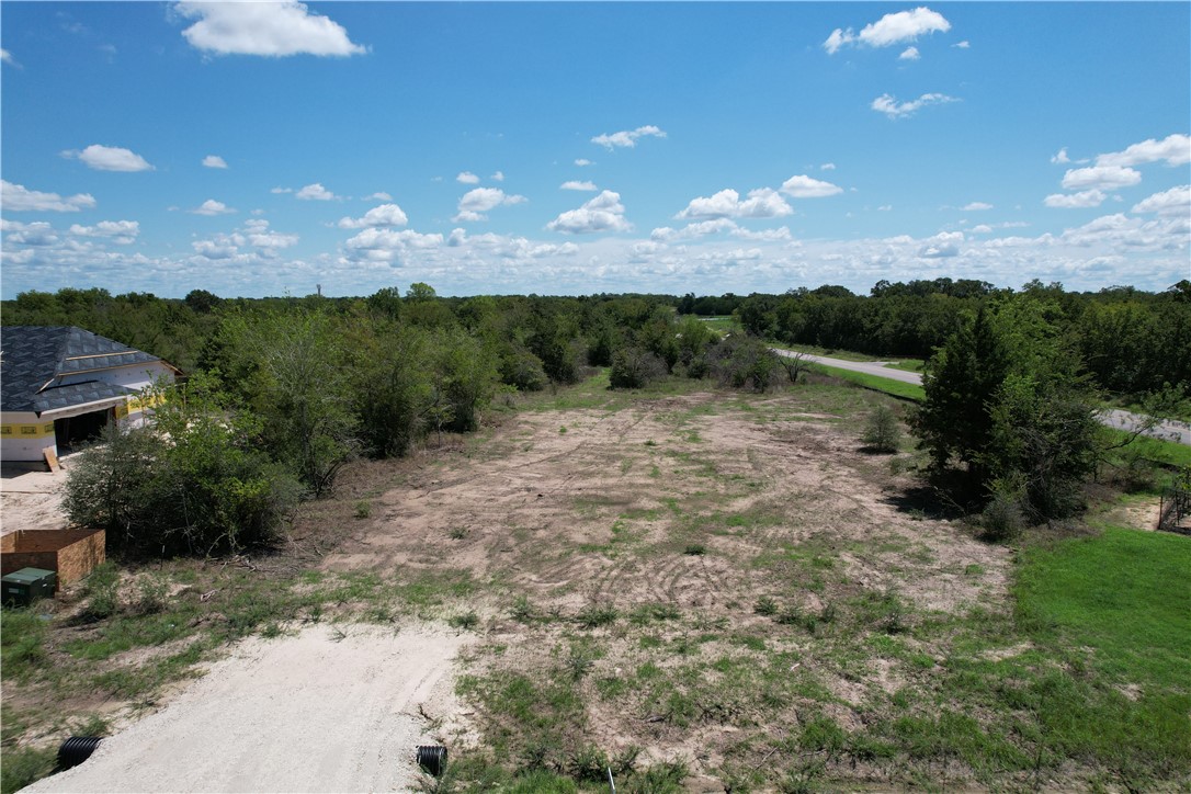 5000 Glory Road Bryan, TX 77808 - Photo 3 of 9 a view of a yard in front of a house with a yard
