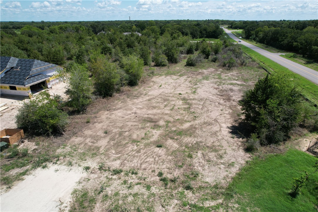 5000 Glory Road Bryan, TX 77808 - Photo 6 of 9 an aerial view of a house with a yard