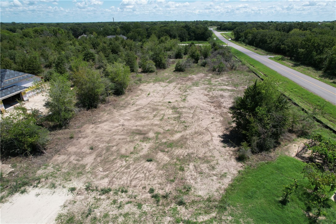 5000 Glory Road Bryan, TX 77808 - Photo 7 of 9 a view of a yard with a pathway