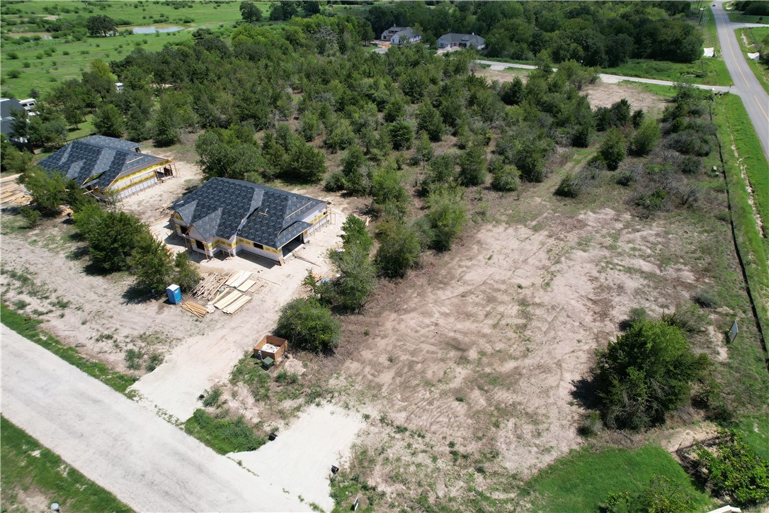 5000 Glory Road Bryan, TX 77808 - Photo 8 of 9 an aerial view of a house with a yard