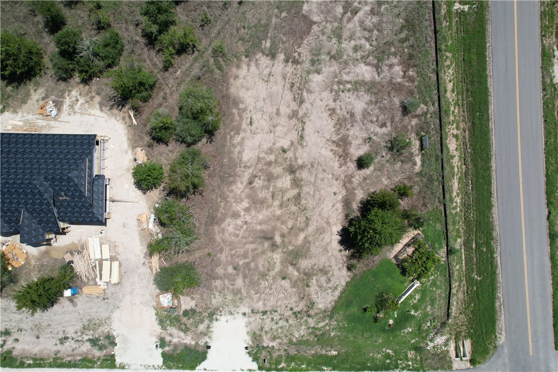 5000 Glory Road Bryan, TX 77808 - Photo 9 of 9 an aerial view of a house with a yard