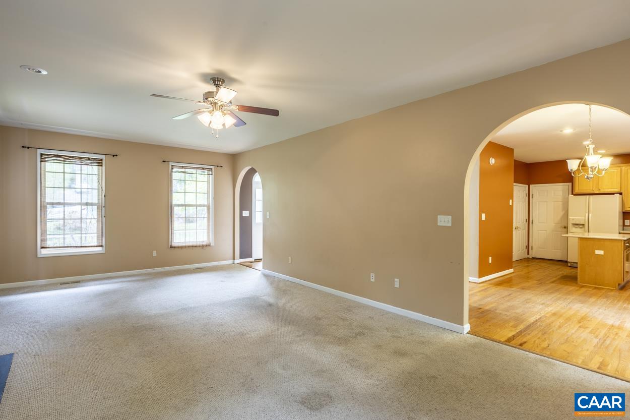 28 Xebec Road Palmyra, VA 22963 - Photo 13 of 34 an empty room with windows and fireplace