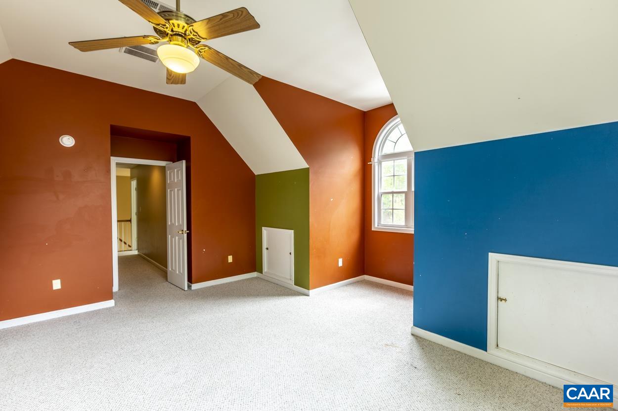 28 Xebec Road Palmyra, VA 22963 - Photo 22 of 34 a view of an empty room with window and a kitchen