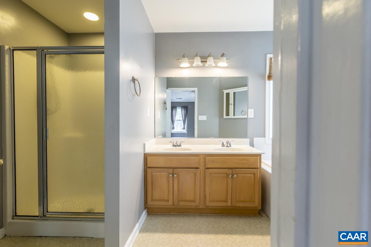 28 Xebec Road Palmyra, VA 22963 - Photo 28 of 34 a bathroom with a sink and a mirror