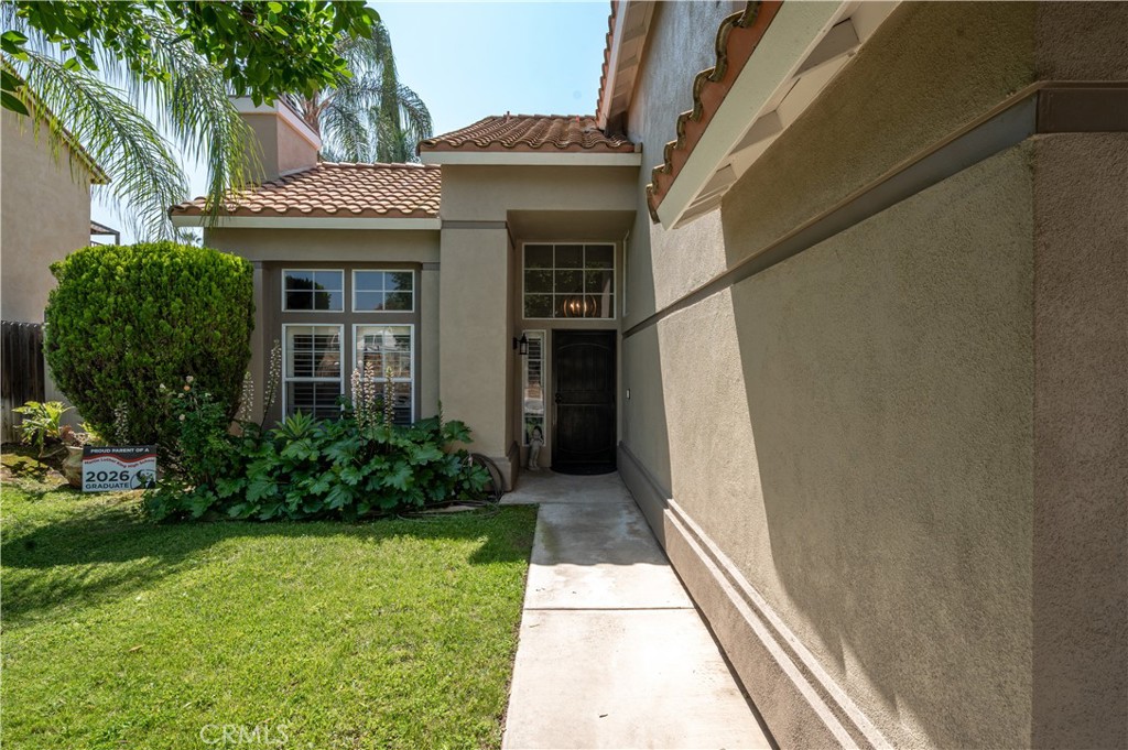 19465 Kinnow Lane Riverside, CA 92508 - Photo 4 of 61 a view of a house with a yard
