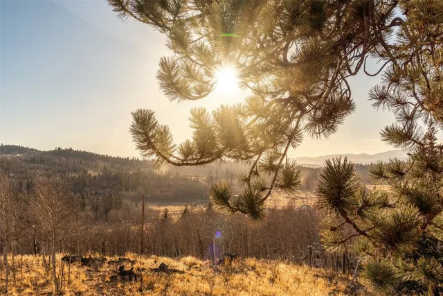 a view of mountain covered with snow