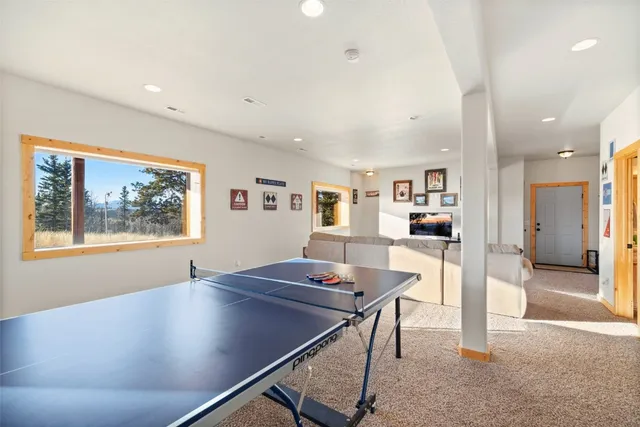 a workspace with furniture and window